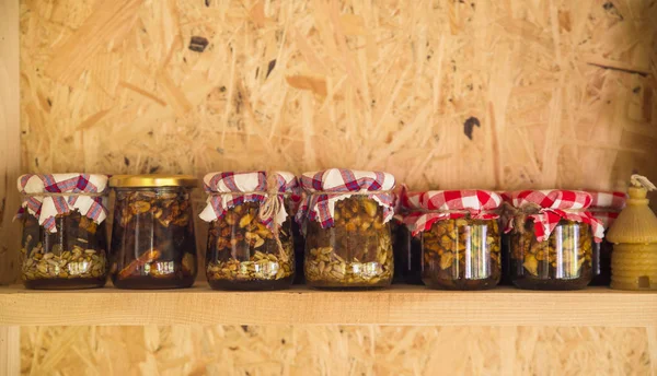 Still life with honey, honeycomb, pollen and propolis — Stock Photo, Image