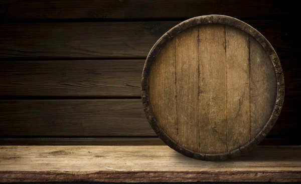 Background of barrel and worn old table of wood. — Stock Photo, Image