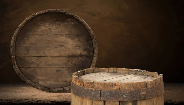 Old wooden barrel on a brown background — Stock Photo, Image