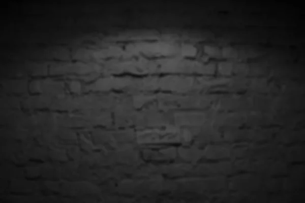 Horizontal part of black painted brick wall — Stock Photo, Image