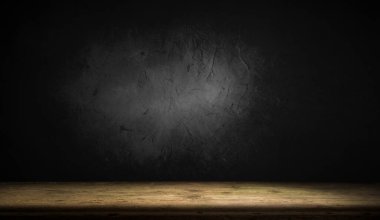 Seçili odak boş kahverengi ahşap masa ve duvar dokusu veya eski siyah tuğla duvar arkaplan bulanık görüntüsü. Fotomontaj ya da ürün gösterimi için