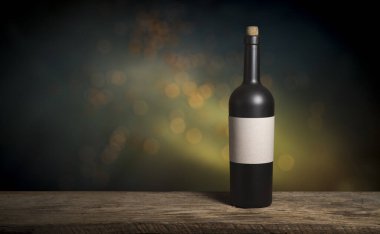 Şarap şişelerinin yanında duran barmen ya da erkek barmen bir bardak şarap tutuyor, renge bakıyor ve kadehteki şarap kokusunu alıyor..