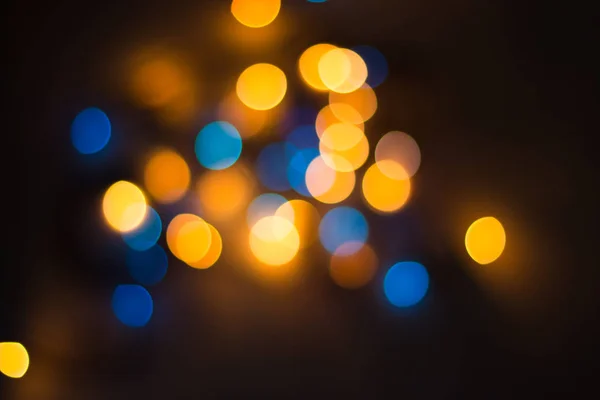 Lights blurred bokeh background from christmas night party for your design — Stock Photo, Image