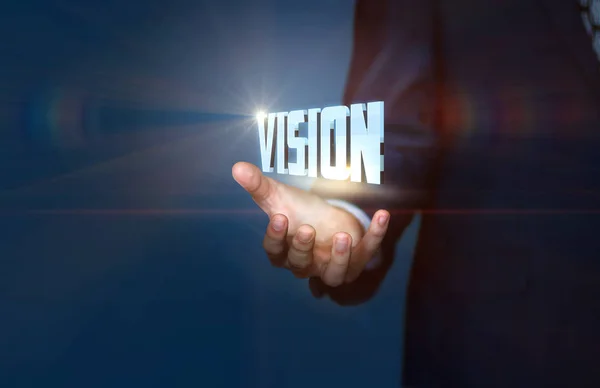 Affärsman visar ordet vision . — Stockfoto