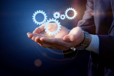 Kontrol mekanizması destekleyen eller.