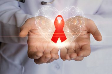 AIDS ve kalp sembol elinde karşı mücadele için şerit.
