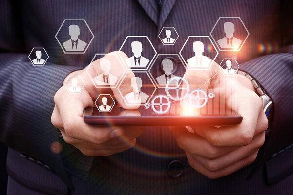 Working with the staff using a phone.