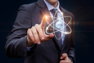 İşadamı dokunur atom .