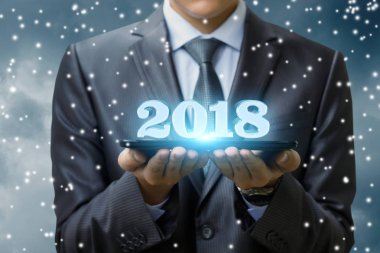 İşadamı gösteren 2018 yeni yıl .