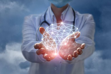 Doktor beyin düşünme modeli elinde gösterir. .