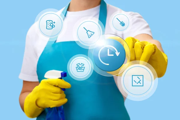 Cleaner clicks on the icon while working . — Stock Photo, Image