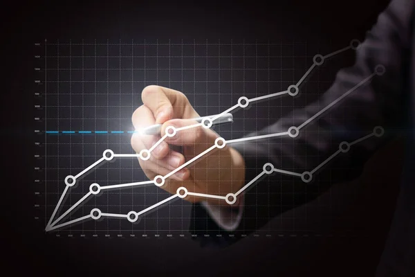 İşadamı Finans istatistiklerinin grafik çizer. — Stok fotoğraf