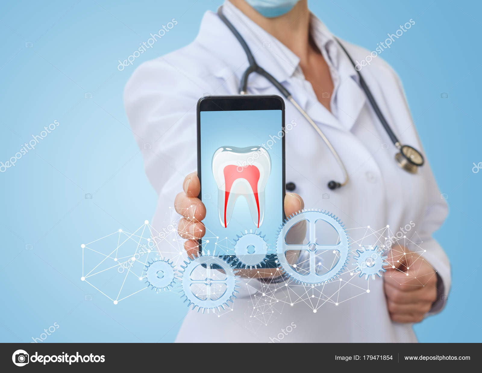 medic in the phone app shows the treatment of the teeth stock