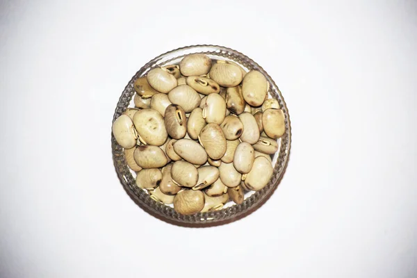 Kadife fasulye ya da Cowitch veya Cowage Lacuna fasulyesi Lyon fasulyesi Konch beej Mucuna pruriens Ayurvedic bitki baklası olarak kullanılır