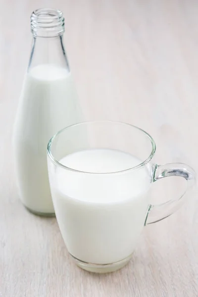 Bottle and glass of milk — Stock Photo, Image