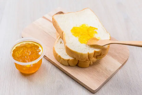 Sliced bread and jam — Stock Photo, Image