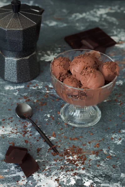 Chocolate ice cream in a Cup. Ice cream balls with chocolate chips. Round ice cream
