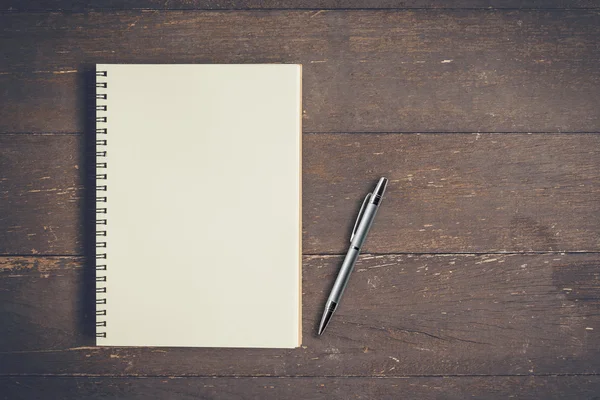 Blank notebook and on wood table with space. — Stock Photo, Image