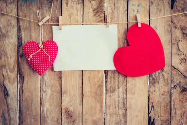 Two heart hanging and paper on clothesline and rope with wooden — Stock Photo, Image