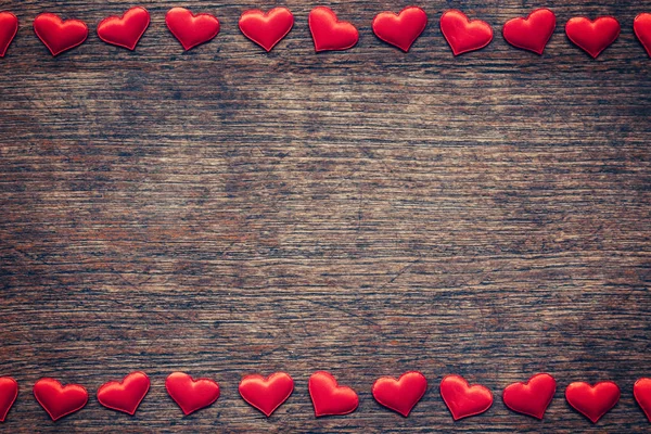 Red heart on wood background with space for Valentine Day. — Stock Photo, Image