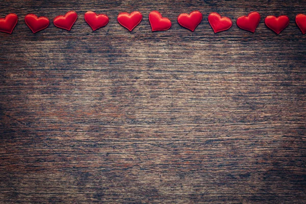 Red heart on wood background with space for Valentine Day. — Stock Photo, Image