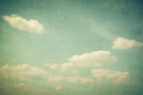 Vintage wolken en blauwe hemel met textuur effect. — Stockfoto