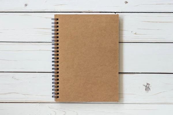 Notebook papier Blank vintage na stół z drewna — Zdjęcie stockowe