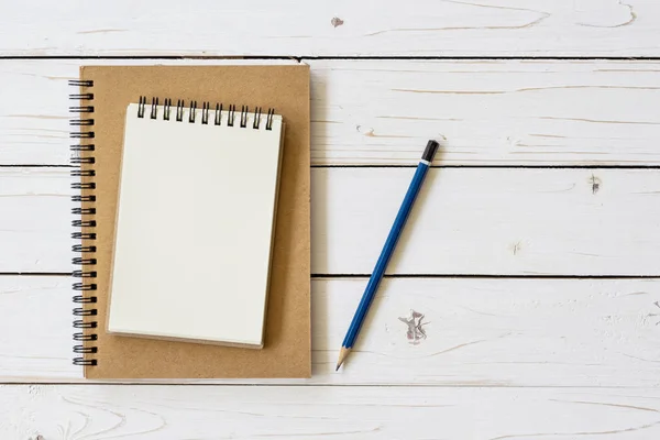 Open notebook with blank pages and pencil — Stock Photo, Image