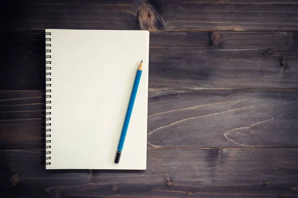 Office wood table with blank notepad, pencil. — Stock Photo, Image