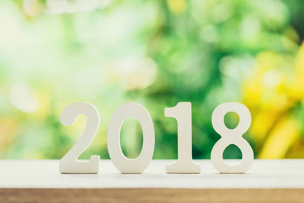 New Year concept for 2018 : Wood numbers 2018 on wood table top — Stock Photo, Image