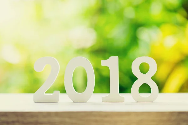 New Year concept for 2018 : Wood numbers 2018 on wood table top — Stock Photo, Image