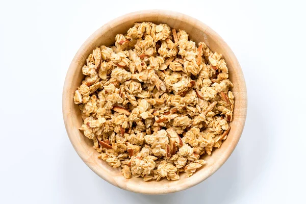 Tigela de Muesli e granola Isolado na vista superior branca . — Fotografia de Stock