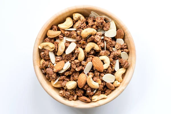 Tigela de Muesli e granola Isolado na vista superior branca . — Fotografia de Stock