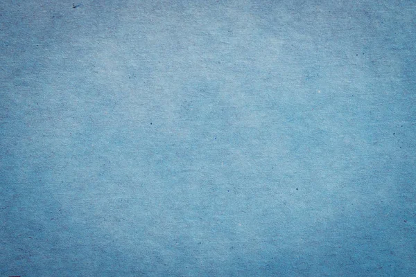 Nahaufnahme blauer Papierstruktur und Hintergrund mit Leerzeichen. — Stockfoto