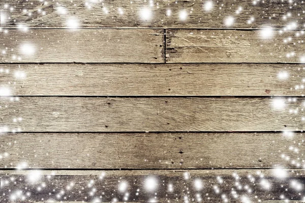 Por encima de la nieve en el fondo del tablero de madera y la textura con espacio para t —  Fotos de Stock