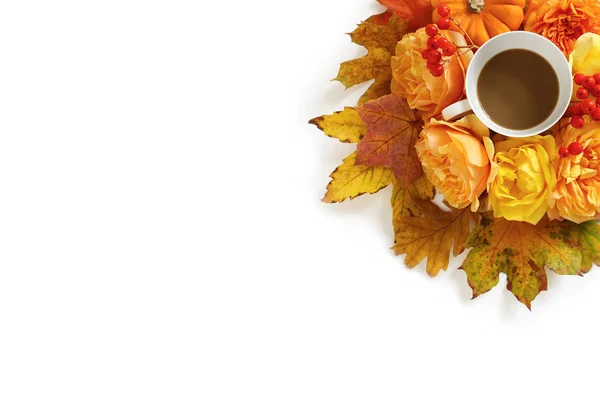Styled stock photo.with cup of coffee and floral composition made of colorful autumn leaves, orange pumpkin, roses and rowan berries isolated on white background. Flat lay, top view. — Stock Photo, Image