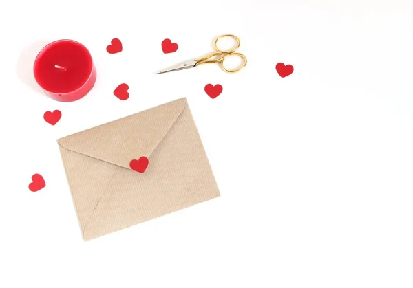 Valentines day or wedding mockup scene with envelope, paper hearts confetti, red candle, golden scissors on white background. Love concept. Flat lay, top view. Empty space for your text. — Stock Photo, Image
