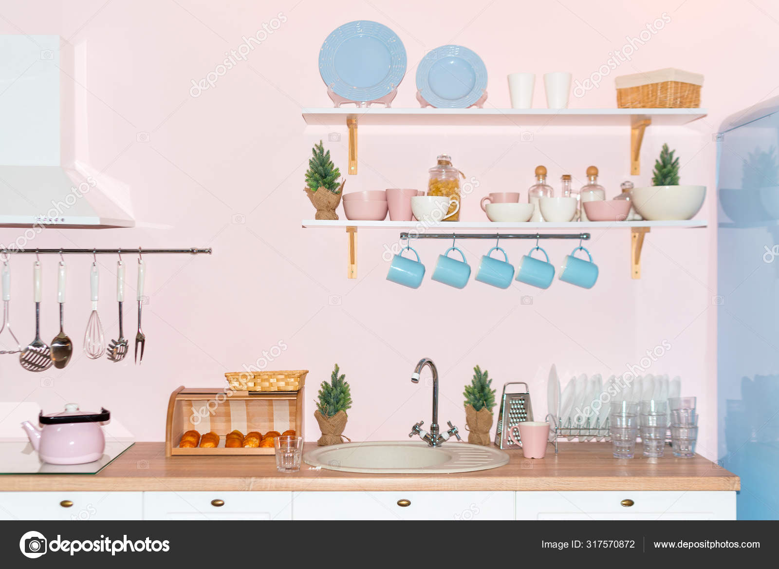 Pink and blue pastel modern kitchen interior. Kitchen accessories