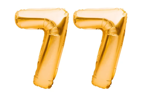 77号77号是用白色隔热的金色充气气球制成的.氦气球，金箔号码。派对装饰，节日，庆典，生日，狂欢节的周年标志 — 图库照片
