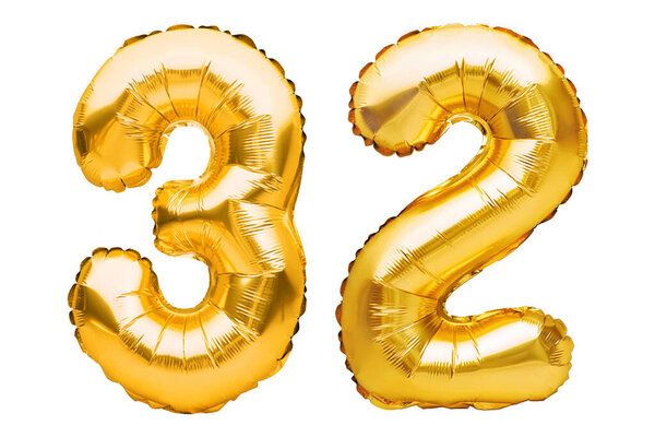Number 32 thirty two made of golden inflatable balloons isolated on white. Helium balloons, gold foil numbers. Party decoration, anniversary sign for holidays, celebration, birthday, carnival