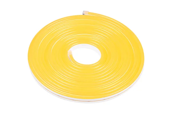 Flexible yellow led tape neon flex in roll isolated on white background. — ストック写真
