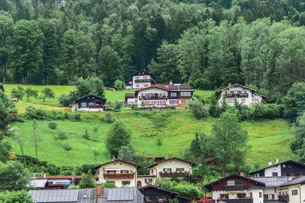 Summer view of houses, hotels and restaurants in the mountains, in the Alps, Berchstengaden