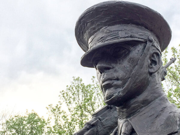 soldier statue stands guard