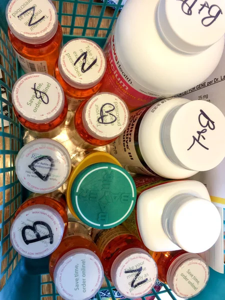 Medicine bottles in tray — Stock Photo, Image