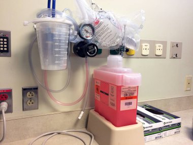 Biyolojik atık konteynırı ve vakum pompası