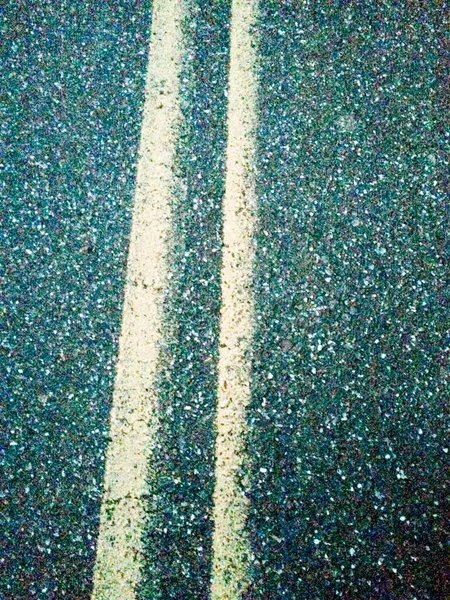 Double yellow road lines — Stock Photo, Image