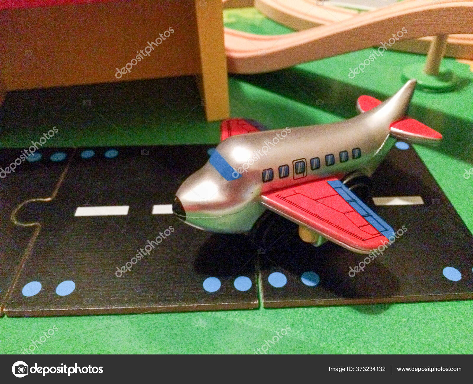 Plane at airport runway in toy city play town in miniature – Stock