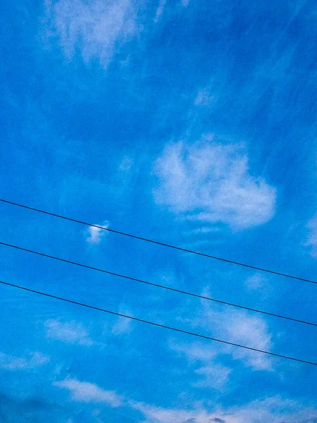 Blue sky cloud electric lines background design element — Stock Photo, Image