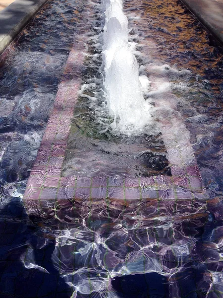 Modern water fountain purple marble design — Stock Photo, Image