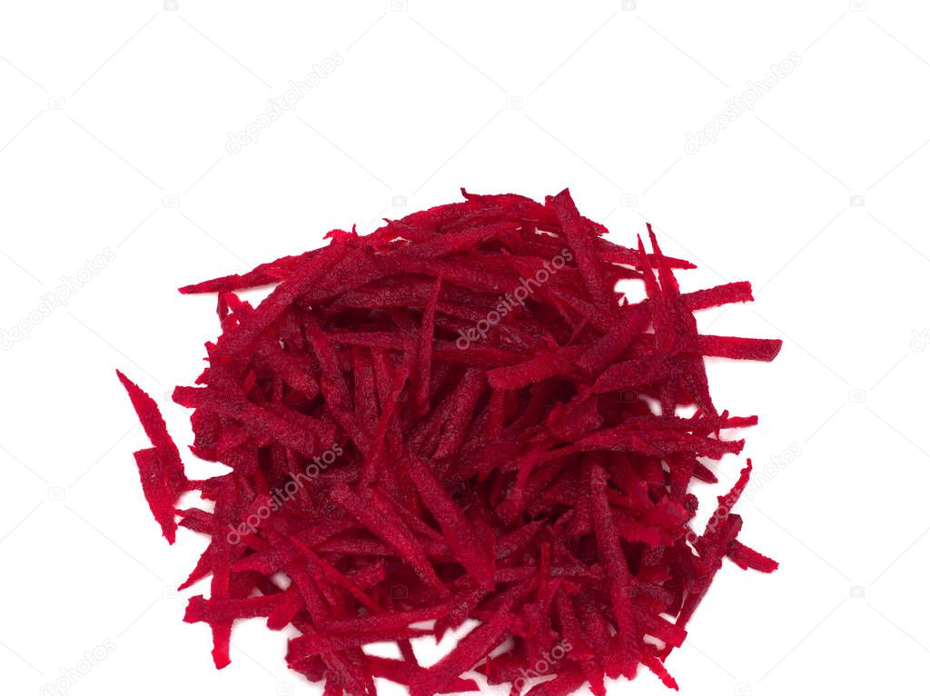 Grated beets on white background